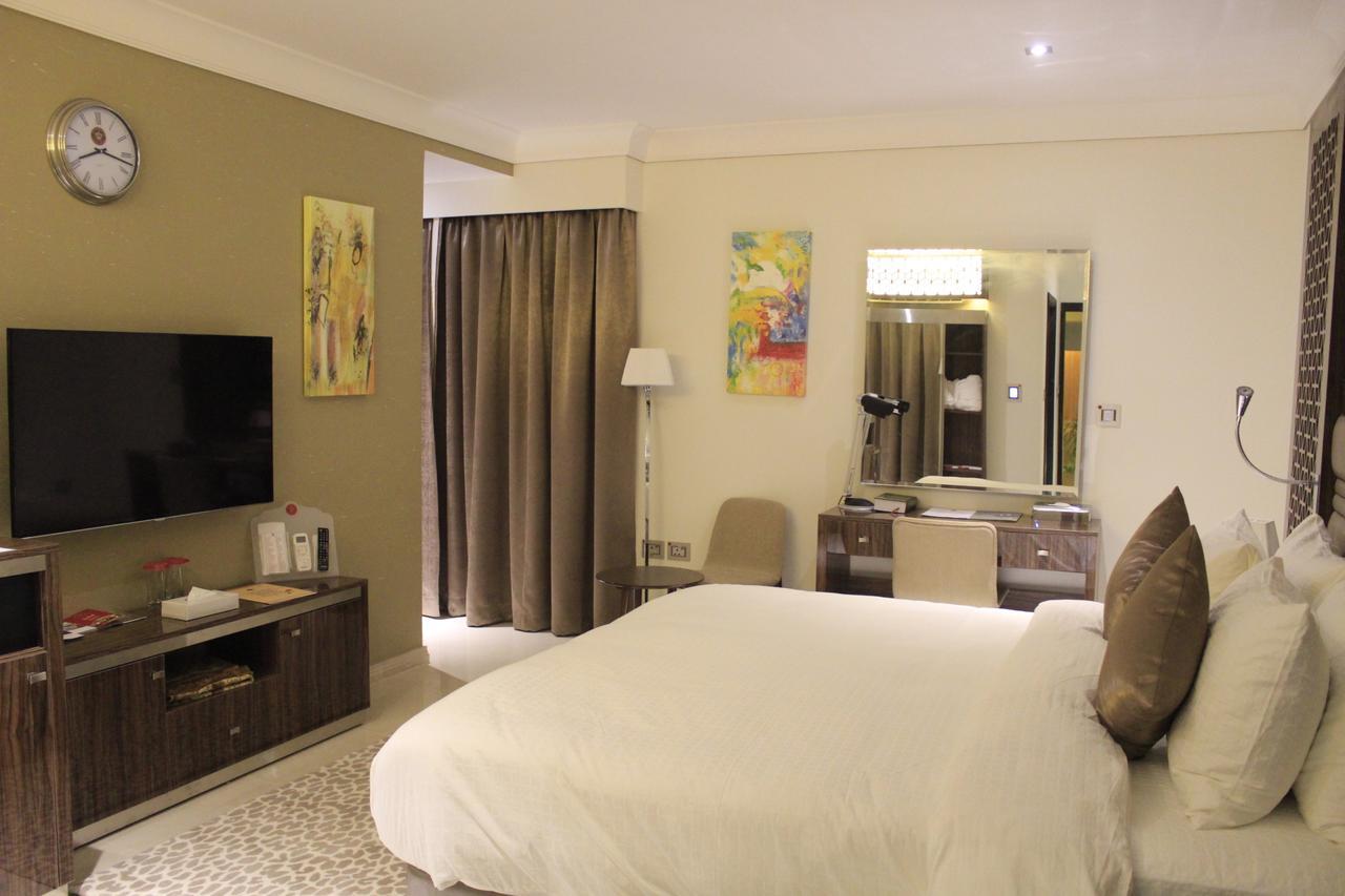 Tio Sea Resort Al Khor Buitenkant foto A bedroom at the hotel